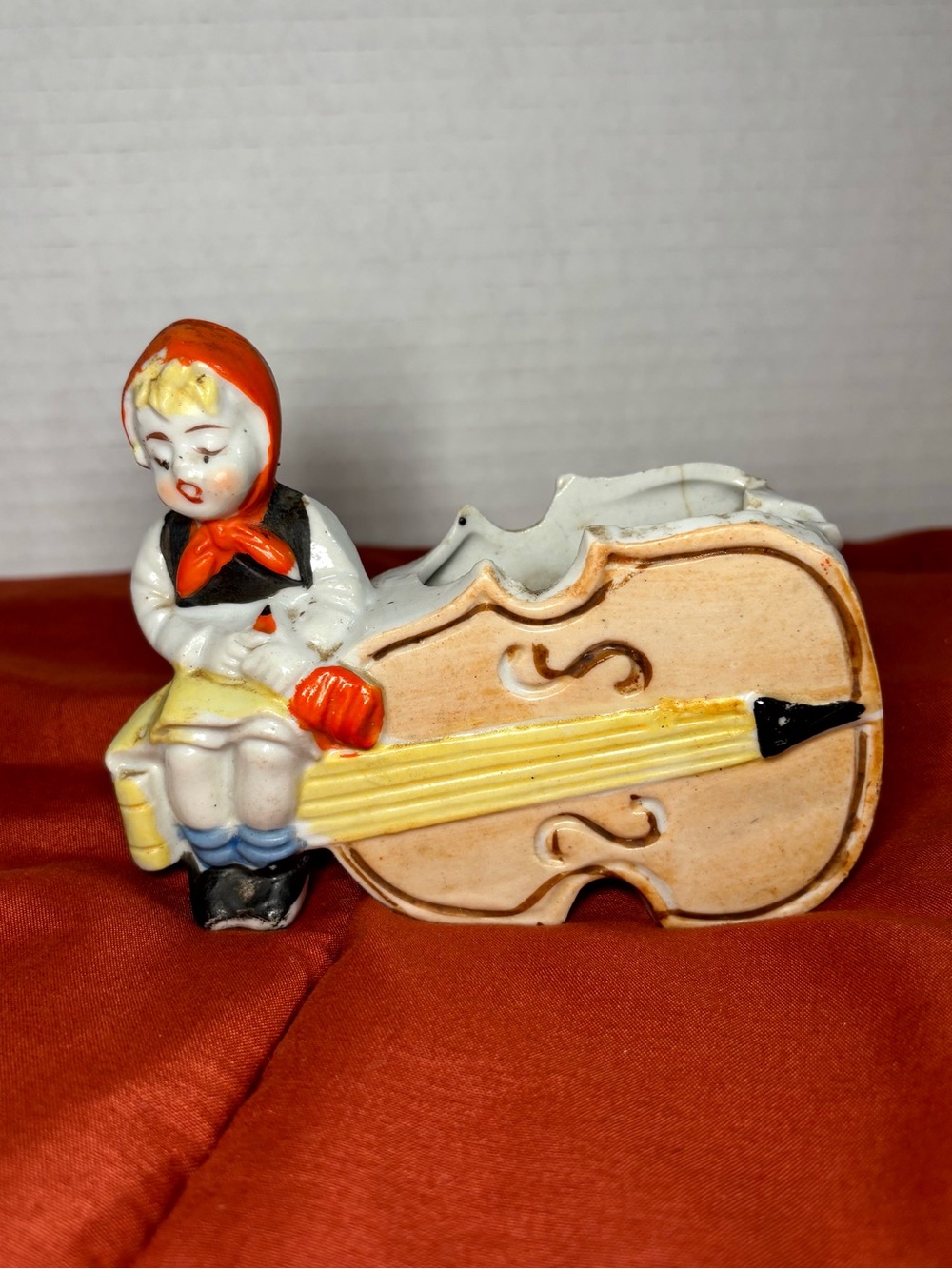 Vintage Ceramic Dutch Girl W/ Cello Figurine Can Be Used As Planter Or Ash Tray